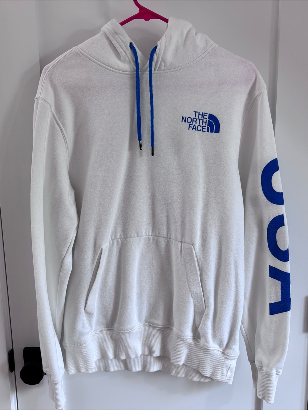 The North Face Men’s White Hoodie with Blue Logo
